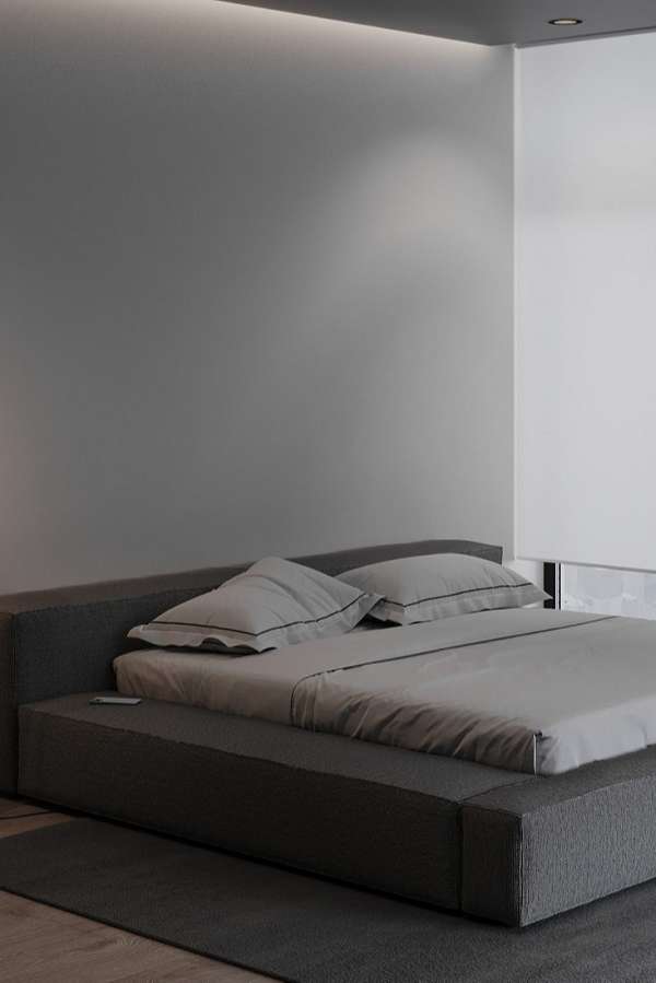 Phòng ngủ chính được thiết kế đơn giản với bảng màu trắng tinh khôi