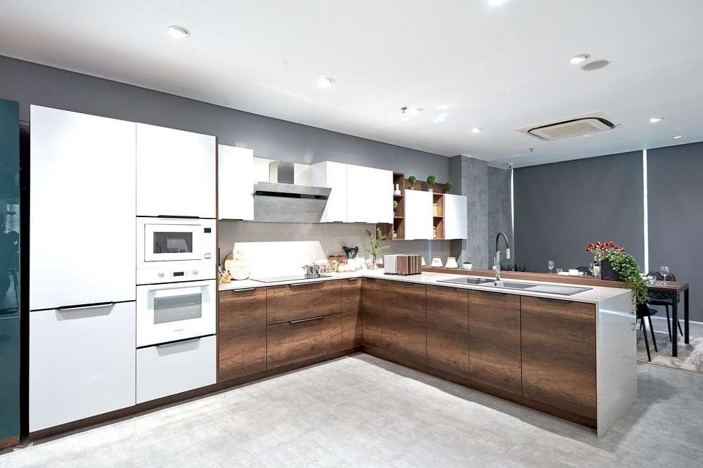 Tủ bếp gỗ MDF phủ Melamine chữ L hiện đại, mang lại không gian sống trẻ trung, độc đáo